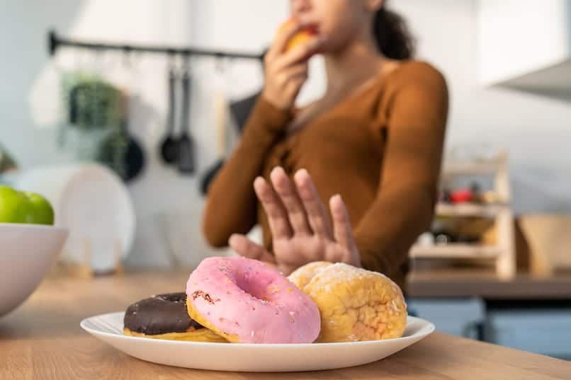 Choosing nutritious food over junk food.